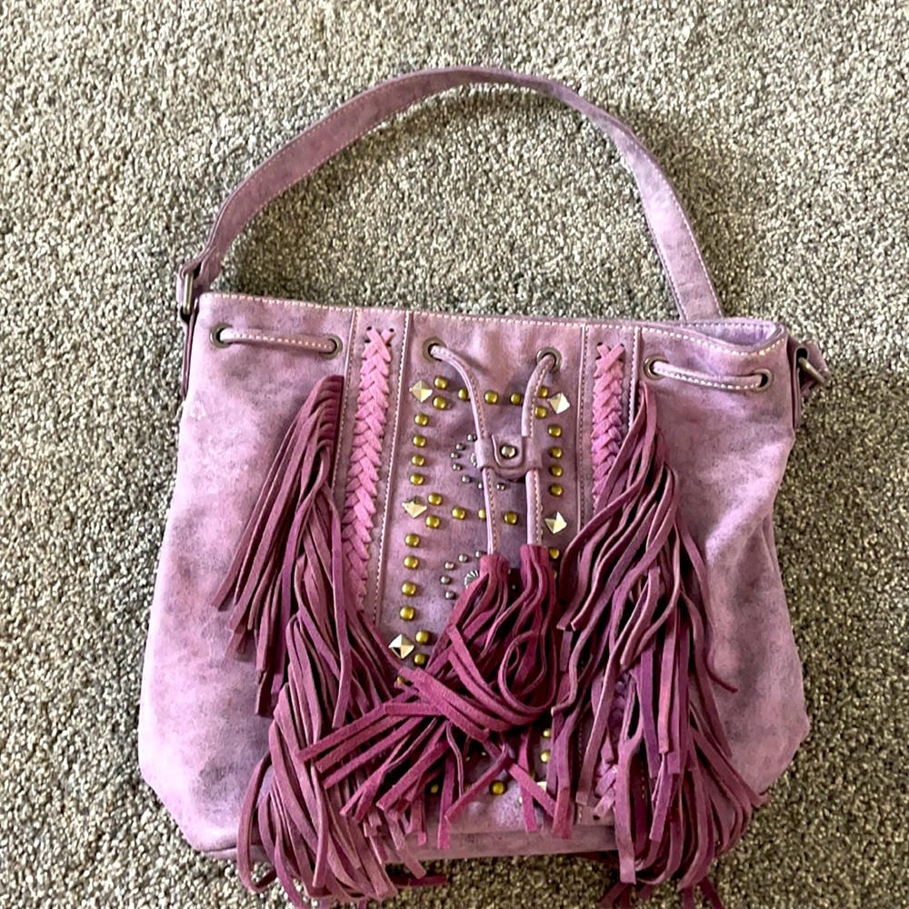 Really nice purple Montana west purse. Never used